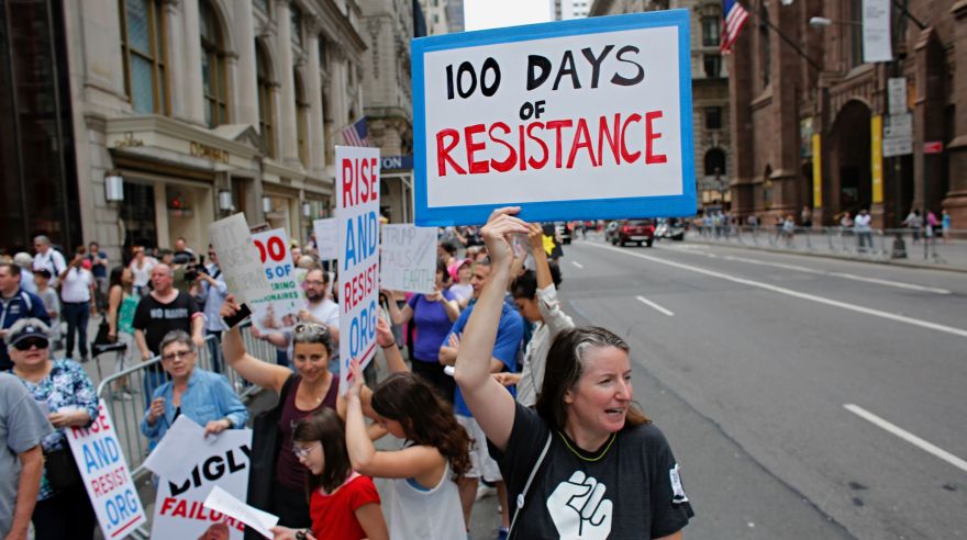 Protesters rally against 100 Days of Trump